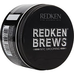 Black container of Redken Brews Maneuver Cream Pomade with white text, emphasizing its NYC Grooming essence, showcased on a white background.