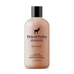 The image shows a bottle of Pete & Pedro Hydrate Cream Hair Rinse, featuring Argan Oil. The bottle has a sleek design with a light beige hue and the logo prominently displayed.