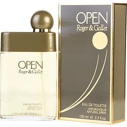 The image showcases a bottle of Open by Roger & Gallet Edt Spray 3.3 oz alongside its packaging. The perfume bottle is sleek with a minimalist design featuring a clear glass container that reveals the amber-colored fragrance inside. It has a spherical cap. The box is elegant, with a golden beige color and a simple graphic of a stylized wave in a darker shade, emphasizing the product's classic and sophisticated appeal.