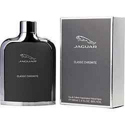 A sleek, black bottle of Jaguar Classic Chromite EDT Spray 3.4 oz, positioned next to its silver-gray packaging box with the Jaguar logo prominently displayed. The box and bottle design reflect a modern and sophisticated aesthetic, highlighting the luxury fragrance inside.