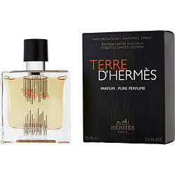 Hermès Terre d'Hermès Pure Parfum bottle, showcasing its elegant rectangular glass design with a silver cap, filled with a warm amber-colored fragrance, symbolizing the luxurious, woody, and citrus scent of cedar, grapefruit, and shiso.